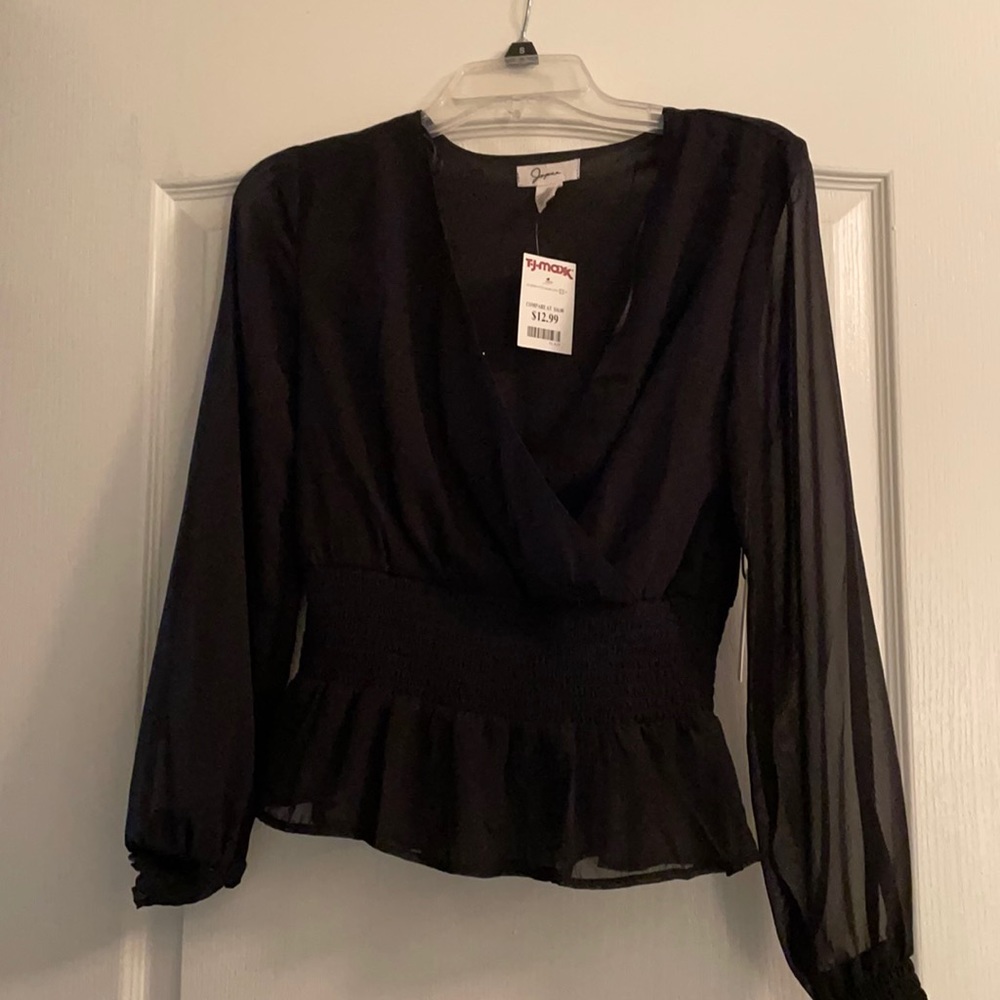 Black shirt with mesh sleeves
